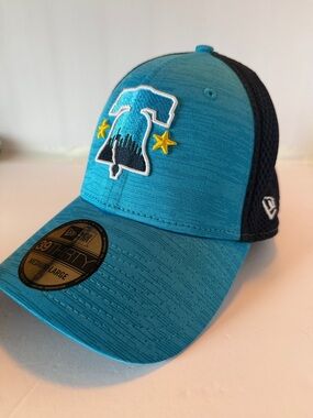 New Era Teal and Black Mesh Trucker Hat with Embroidered Liberty Bell and Stars